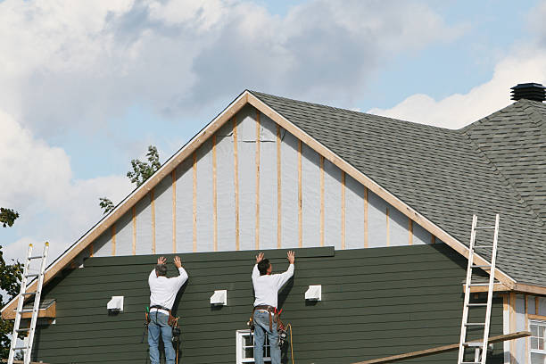Professional Emergency Siding Repair technician working in Monroe, OH